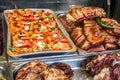 Stainless steel tray with Romanian food box for sale at street food market