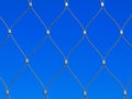 stainless steel twisted wire cable fence detail. diamond pattern net or mesh Royalty Free Stock Photo