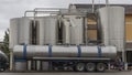 Stainless steel wine tanks and wine tanker Royalty Free Stock Photo