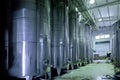 Stainless steel wine vats in a row Royalty Free Stock Photo