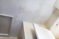 Stains on the ceiling after water leakage, humidity on wall