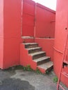 : staircase in red painted area.