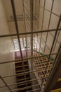 Stair case with safety cage in HMP Shrewsbury, an abandoned prison