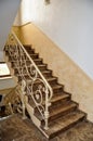 Stair of Italian marble, with forged fencing.