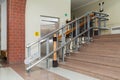 Stair lift for the disabled. Stairs of public building Royalty Free Stock Photo