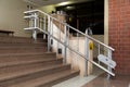 Stair lift for the disabled. Stairs of public building Royalty Free Stock Photo