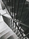 Staircase with black railings, concrete steps, modern architecture, monochrome scheme Royalty Free Stock Photo