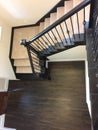 Staircase with carpet from entry to the second floor