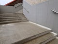 a staircase with concrete sides at a public building. the Royalty Free Stock Photo