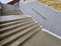 a staircase with concrete sides at a public building. the Royalty Free Stock Photo