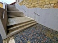 a staircase with concrete sides at a public building. the Royalty Free Stock Photo