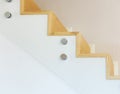 Staircase covered in oak parquet with tempered glass balustrade and chromed pins Royalty Free Stock Photo