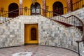 Staircase covered with red carpet in lobby Royalty Free Stock Photo