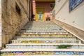 Staircase of decorated ceramic tiles leading up from the fishing port of Sciacca Sicily, Italy