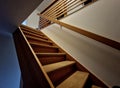 staircase in the house is lined with carpeted stairs. the carpet is