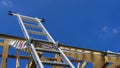 Staircase leading to the roof, wooden roof construction, symbolic photo for home, house building Royalty Free Stock Photo