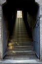 Staircase with light shining through window Royalty Free Stock Photo