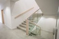 Staircase in a medical facility. Stairs in a modern white interior. Medical clin