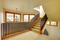 Staircase with metal railing. New luxury home interior.