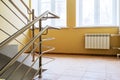 Staircase with metallic handrails