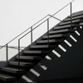 Staircase with minimalist design featuring dark, floating step Royalty Free Stock Photo