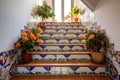 staircase with multicolored, floral spanish tiles