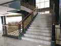 a staircase with an octagonal patterned railing in a large Mosque