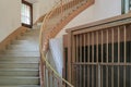 Staircase in prison next to a lattice window Royalty Free Stock Photo