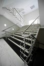 Staircase with a steel handrail Royalty Free Stock Photo