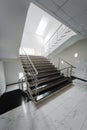 Staircase with a steel handrail