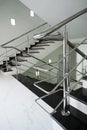 Staircase with a steel handrail Royalty Free Stock Photo