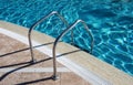 Staircase in swimming pool Royalty Free Stock Photo