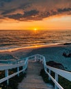 Staircase and view of the Pacific Ocean at sunset, at Windansea Beach, in La Jolla, California Royalty Free Stock Photo