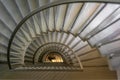 A staircase winding down a building Royalty Free Stock Photo