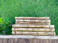 Staircases made of a group of bamboo's trees, which were tied in parallel with rattan. Directly above view.