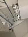 Staircases or stairway made od concerete painted white with grey metal railings in Central Library Zurich Switzerland close up