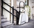 Stairlift on staircase for elderly people and disabled persons