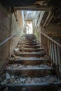 Stairs in an abandoned insane asylum Royalty Free Stock Photo