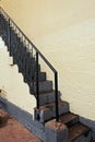 Stairs and the banister create geometrical shapes bank of stone wall at river Godavari