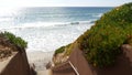Stairs, beach access in California USA. Coastal stairway, pacific ocean. Sunny day, empty staircase.