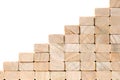 Stairs to success build with wooden blocks on grey background with copy space Royalty Free Stock Photo