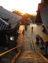 Stairs and buildings lit up by sunset, Nigatsu-do temple, Nara Japan. Royalty Free Stock Photo