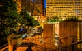 Stairs and buildings at night at the Inner Harbor in Baltimore, Royalty Free Stock Photo