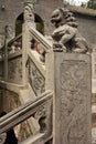 Stairs with carved stone lion statue in a temple