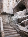 Stairs carved in stone rock - grot Royalty Free Stock Photo