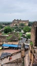 Stairs, clouds, sky, castle, people, shops, trees,