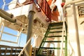 Stairs in container merchant vessel from main deck to life boat embarkation deck Royalty Free Stock Photo