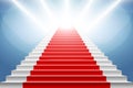 Stairs covered with red carpet. Scene illuminated by a spotlight Royalty Free Stock Photo