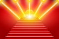 Stairs covered with red carpet. Scene illuminated by a spotlight Royalty Free Stock Photo