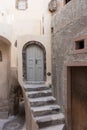 Stairs and door in the old traditional village of Emporio, Santorini